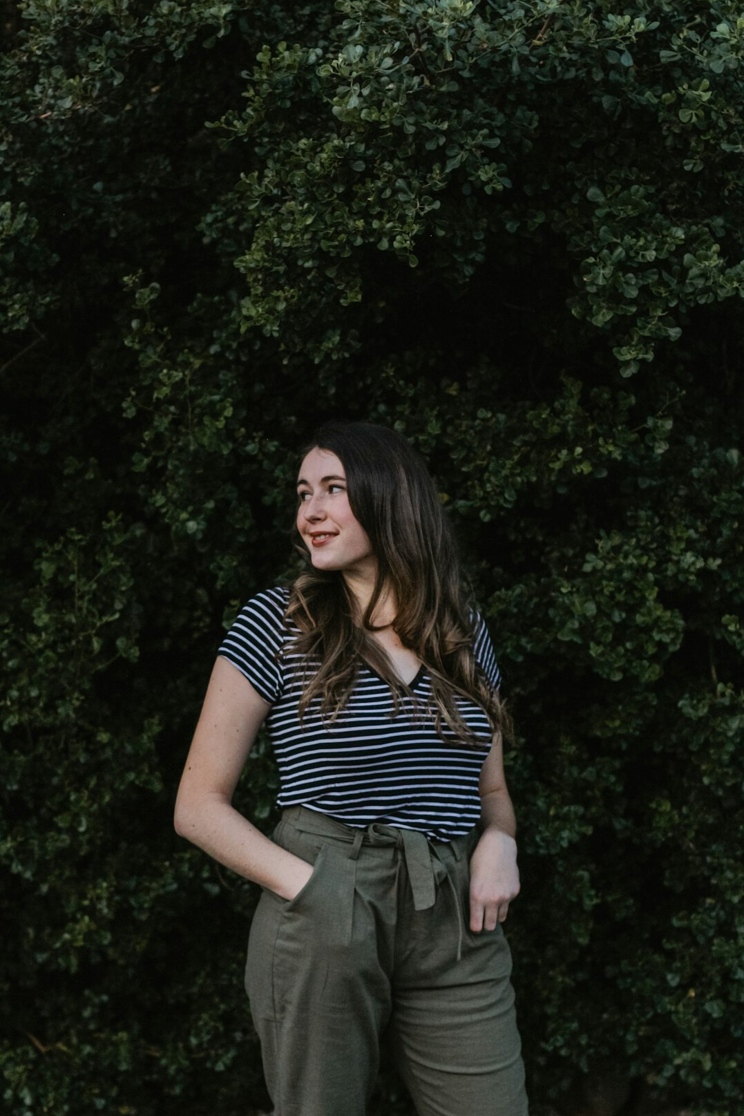 Portrait of a smiling woman in a casual work outfit