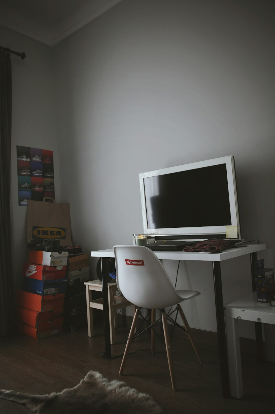 Home table with laptop and a small chair to repair