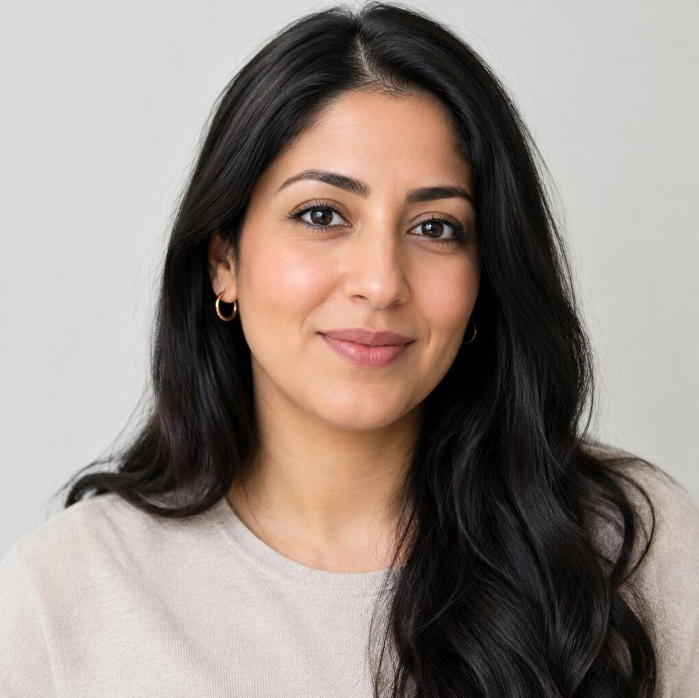 Portrait of a young woman with long hair smiling